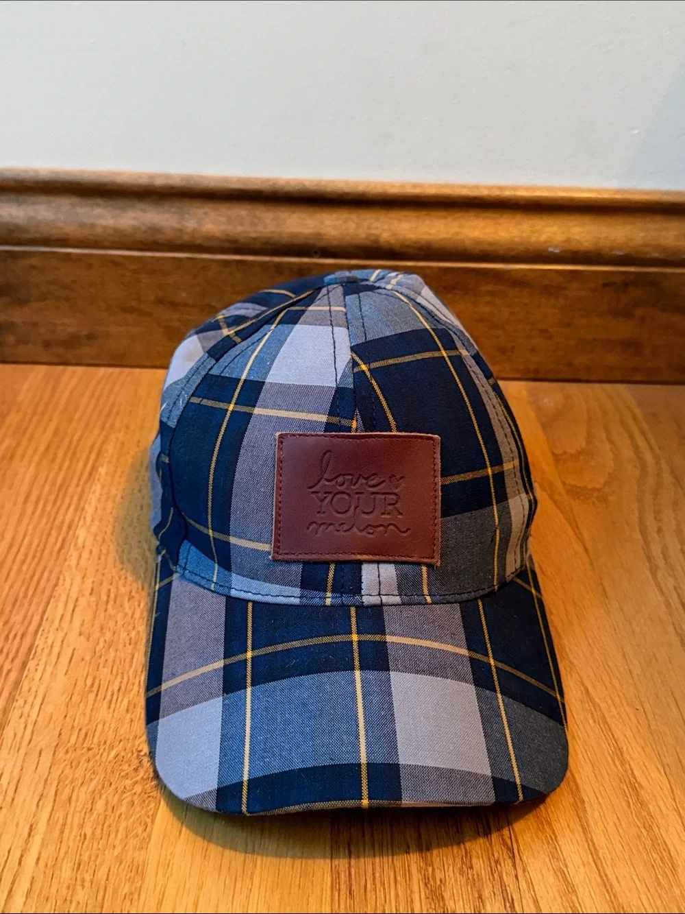 Love your melon plaid hat with leather logo